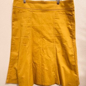Nuggles||mustard skirt